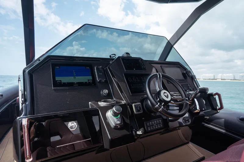  Yacht Photos Pics Modern helm of 2023 Skipper-BSK 42NC boat with advanced navigation controls.