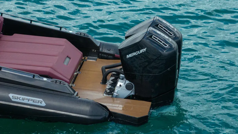  Yacht Photos Pics Skipper-BSK 42NC boat with Mercury engines on blue water, 2023 model.