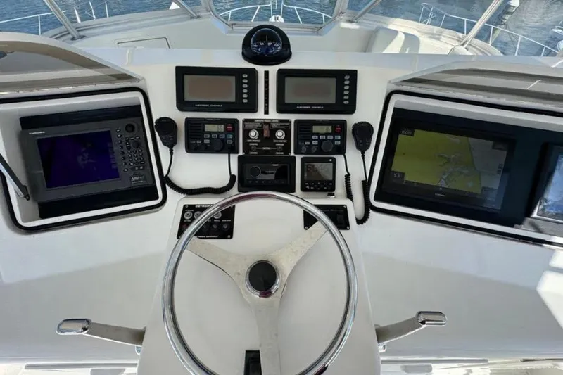 Trolling Fever Yacht Photos Pics Helm of 2005 Ocean Yachts 46 Super Sport with navigation and control systems.