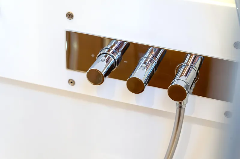 Cloudy Night Yacht Photos Pics Chrome control knobs on a CNB 76 yacht, 2019 model.