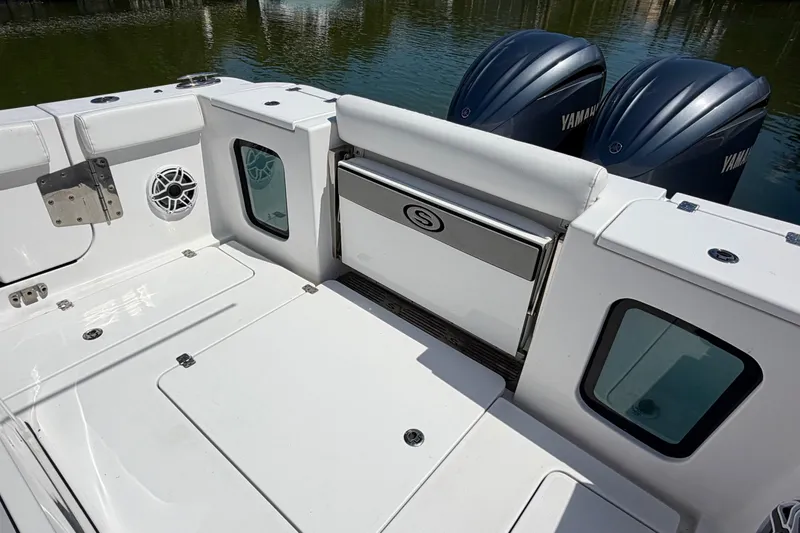  Yacht Photos Pics 2021 Sportsman Open 302 Center Console boat with Yamaha engines, featuring spacious deck and seating.