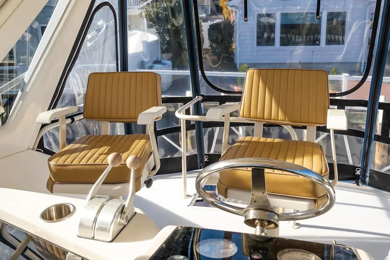 Falcon Yacht Photos Pics Cockpit of 1998 Ocean Yachts 48 Super Sport with tan seats and steering wheel.