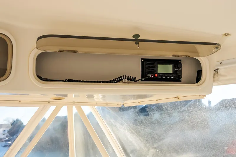 Falcon Yacht Photos Pics 1998 Ocean Yachts 48 Super Sport radio compartment with communication equipment.