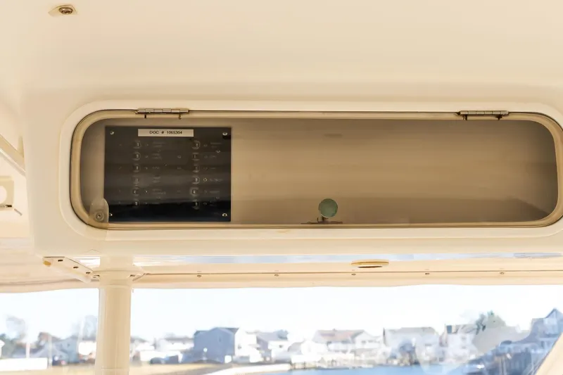 Falcon Yacht Photos Pics 1998 Ocean Yachts 48 Super Sport interior control panel with scenic background view.