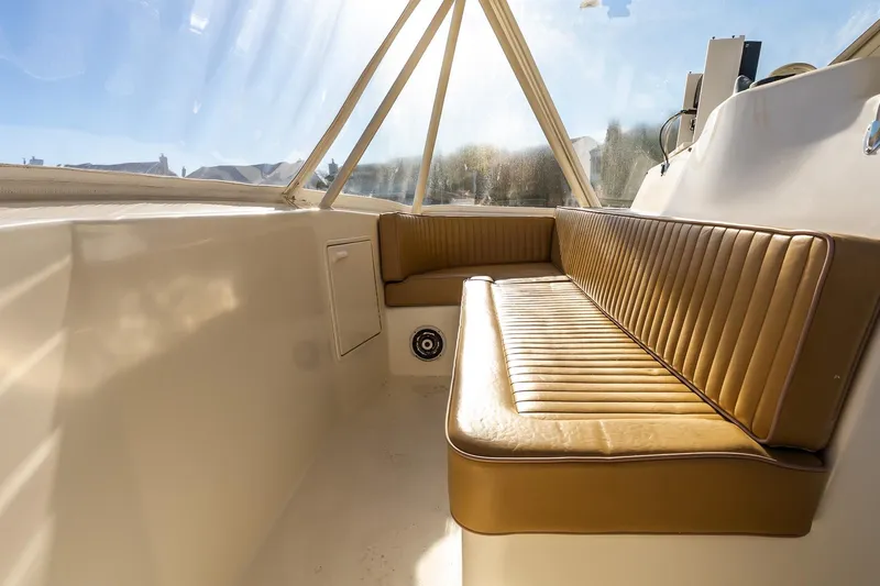 Falcon Yacht Photos Pics Interior seating of 1998 Ocean Yachts 48 Super Sport, featuring tan leather upholstery.