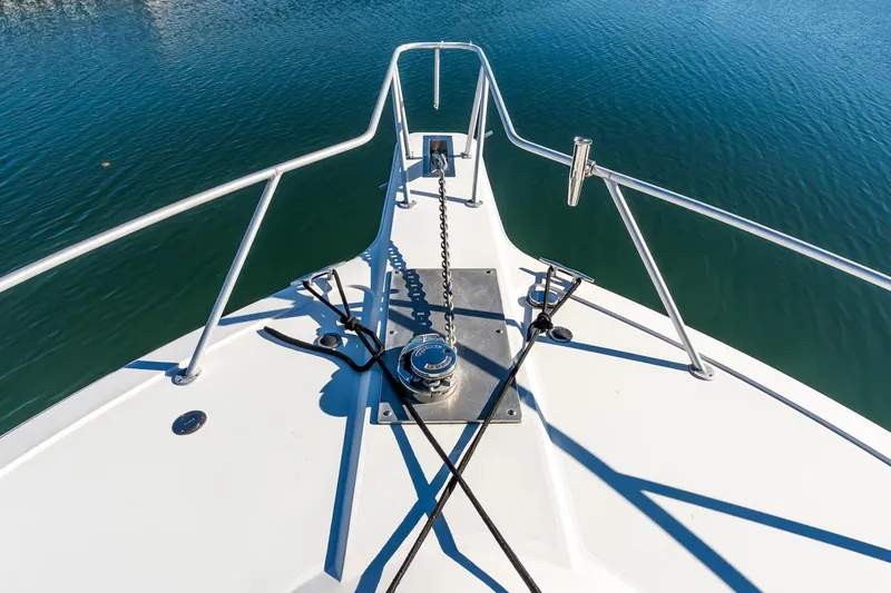 Falcon Yacht Photos Pics Bow view of 1998 Ocean Yachts 48 Super Sport on calm water.