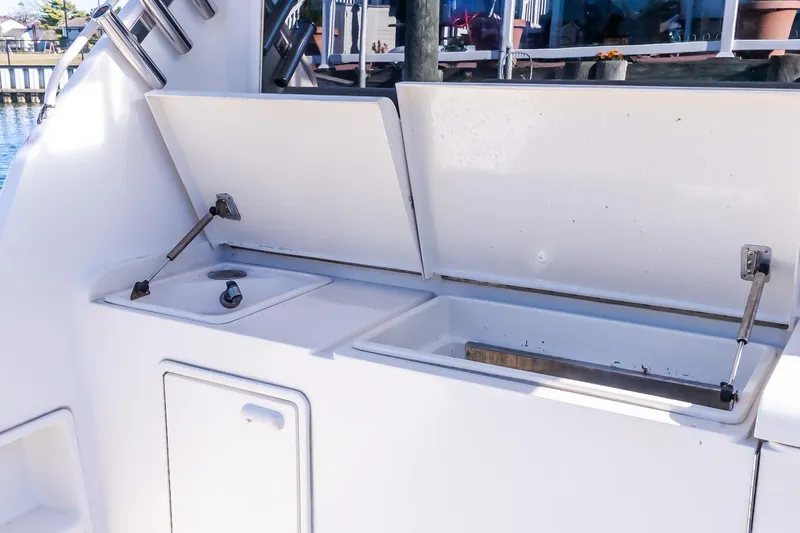 Falcon Yacht Photos Pics Open storage compartments on a 1998 Ocean Yachts 48 Super Sport boat.