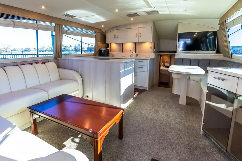 Falcon Yacht Photos Pics Luxurious interior of 1998 Ocean Yachts 48 Super Sport with elegant seating and modern amenities.