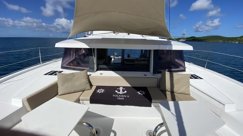  Yacht Photos Pics Sailing yacht Bali 4.0, 2017 model, with spacious deck and seating, under clear blue skies.