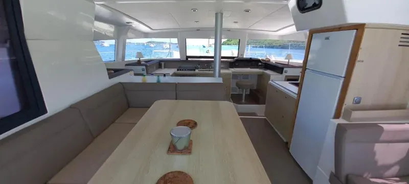  Yacht Photos Pics Spacious interior of 2017 Bali 4.0 catamaran with modern kitchen and dining area.