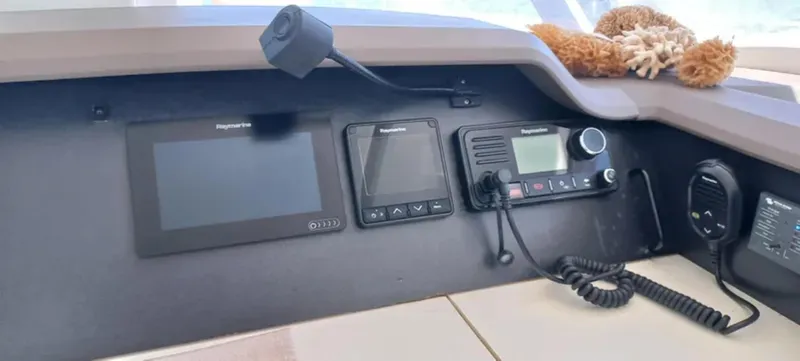  Yacht Photos Pics Control panel of a 2017 Bali 4.0 yacht with navigation and communication equipment.