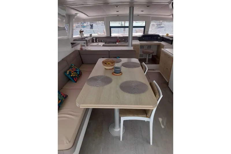  Yacht Photos Pics Spacious interior of 2017 Bali 4.0 yacht with dining area and modern kitchen.