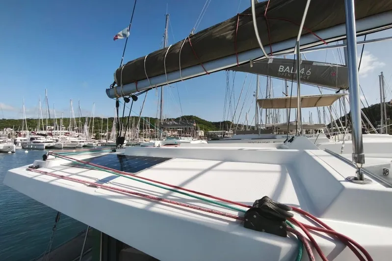  Yacht Photos Pics Sailing catamaran Bali 4.0, 2017 model, docked in a marina with clear blue skies.
