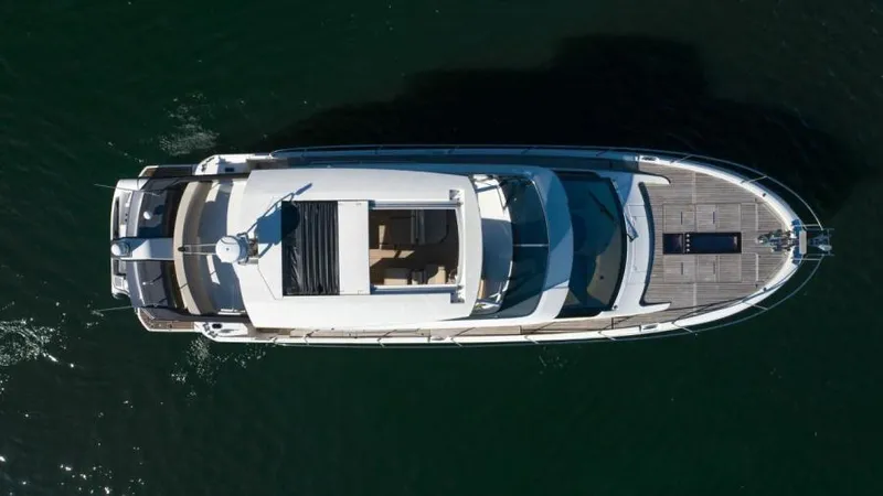 Osiris Yacht Photos Pics Aerial view of 2022 Beneteau Monte Carlo 6 yacht on water.
