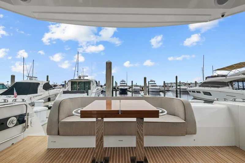 Osiris Yacht Photos Pics Luxury Beneteau Monte Carlo 6 yacht deck with marina view, 2022 model.