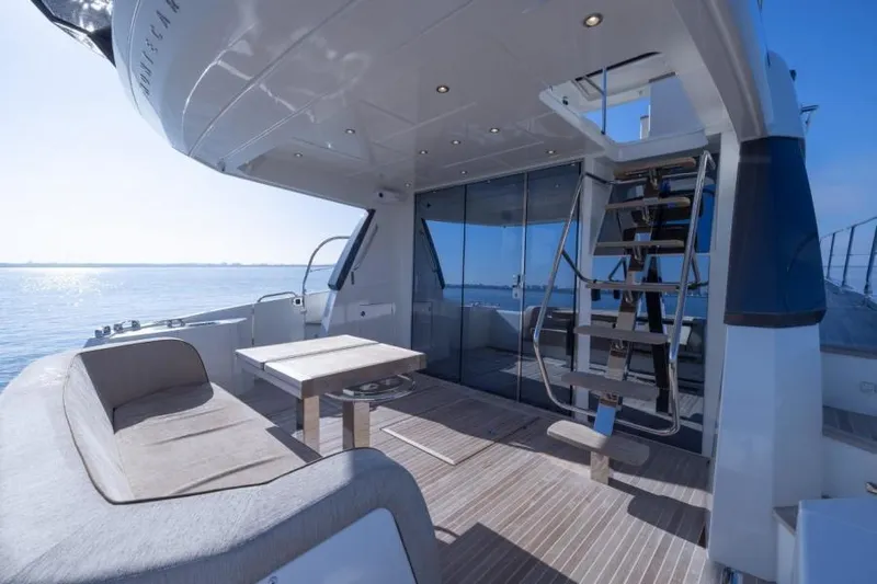 Osiris Yacht Photos Pics Luxury Beneteau Monte Carlo 6 yacht deck, 2022 model, with seating and ocean view.