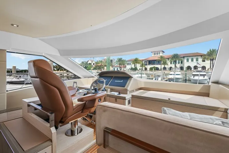 Osiris Yacht Photos Pics Luxurious interior of 2022 Beneteau Monte Carlo 6 yacht with marina view.