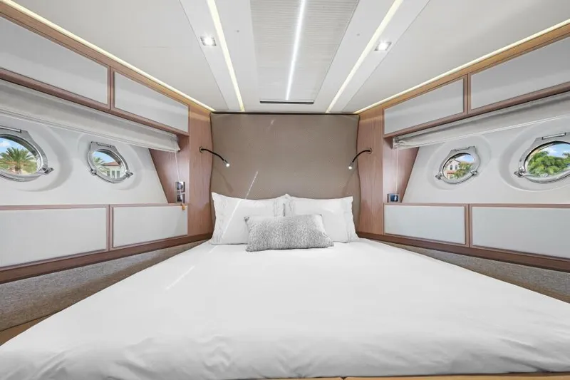 Osiris Yacht Photos Pics Luxurious bedroom interior of 2022 Beneteau Monte Carlo 6 yacht with modern design.