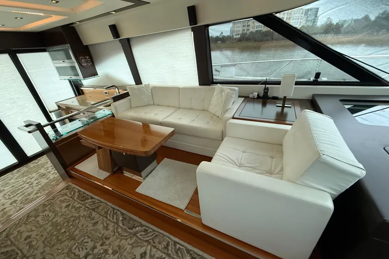  Yacht Photos Pics Luxurious interior of 2016 Tiara Yachts 50 Coupe with elegant seating and modern design.