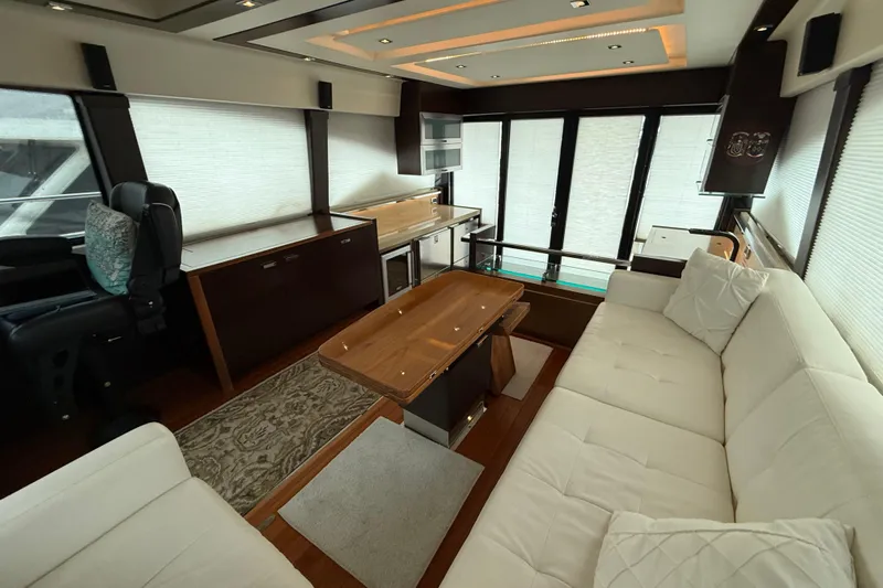  Yacht Photos Pics Luxurious interior of 2016 Tiara Yachts 50 Coupe with elegant seating and modern design.