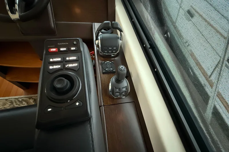  Yacht Photos Pics Control panel of 2016 Tiara Yachts 50 Coupe with Garmin navigation system.