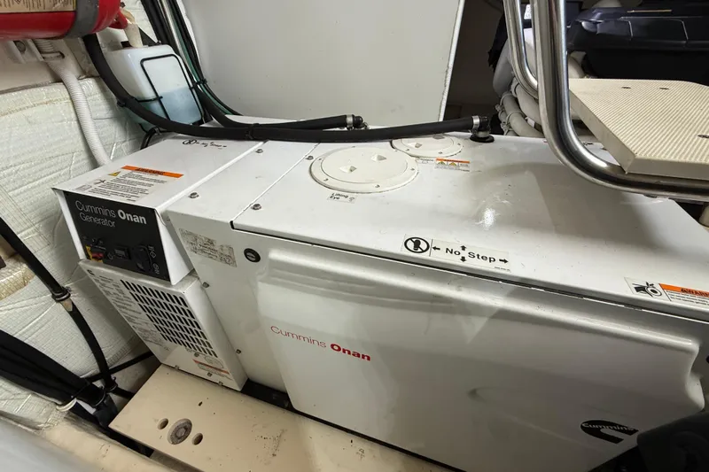  Yacht Photos Pics Cummins Onan generator in 2016 Tiara Yachts 50 Coupe engine room.