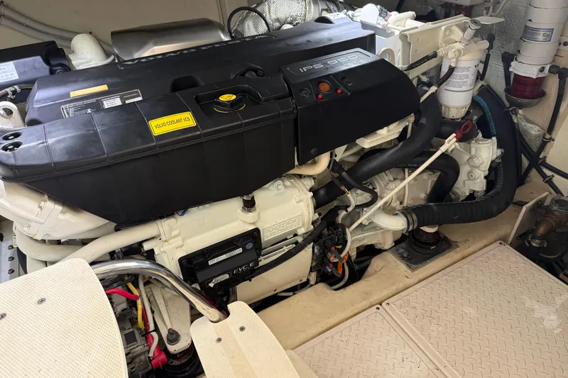  Yacht Photos Pics Engine compartment of a 2016 Tiara Yachts 50 Coupe, featuring a Volvo IPS 950 engine.