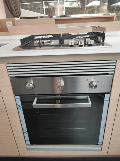  Yacht Photos Pics Modern kitchen in 2025 Fountaine Pajot Catamaran Aura 51 with stove and oven.