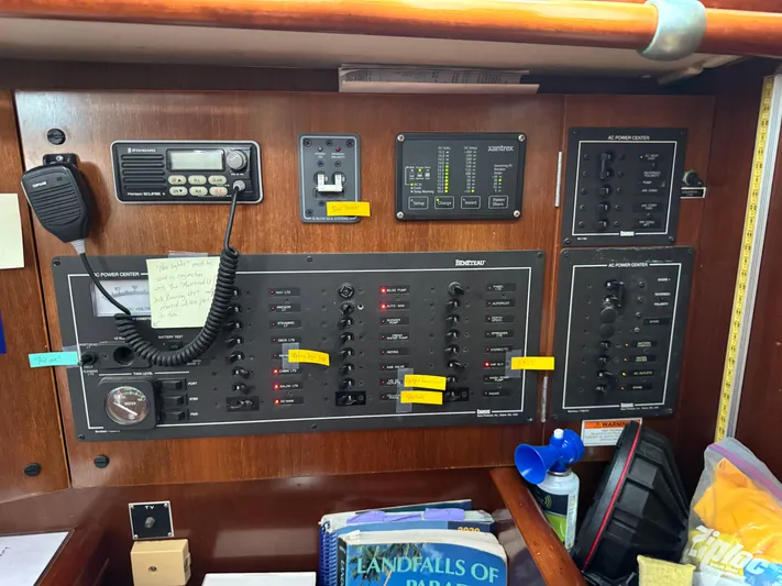 Layla Yacht Photos Pics Electrical control panel of a 1997 Beneteau Oceanis 461 sailboat with various switches and labels.