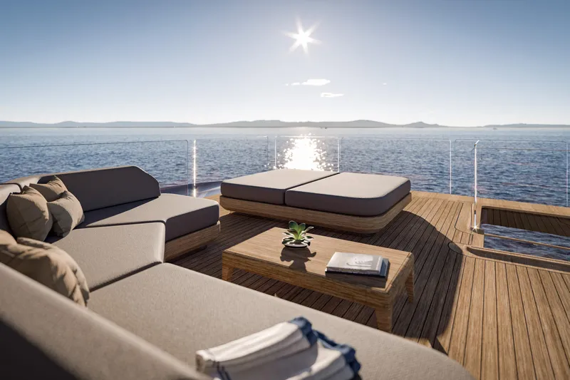 Ceccarelli 40 Project Yacht Photos Pics Luxurious yacht deck with modern seating, wooden table, and ocean view, by Tuxedo Yachting House, 2028.