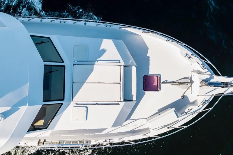  Yacht Photos Pics Aerial view of 2000 Hatteras 74 Cockpit Motor Yacht on water.