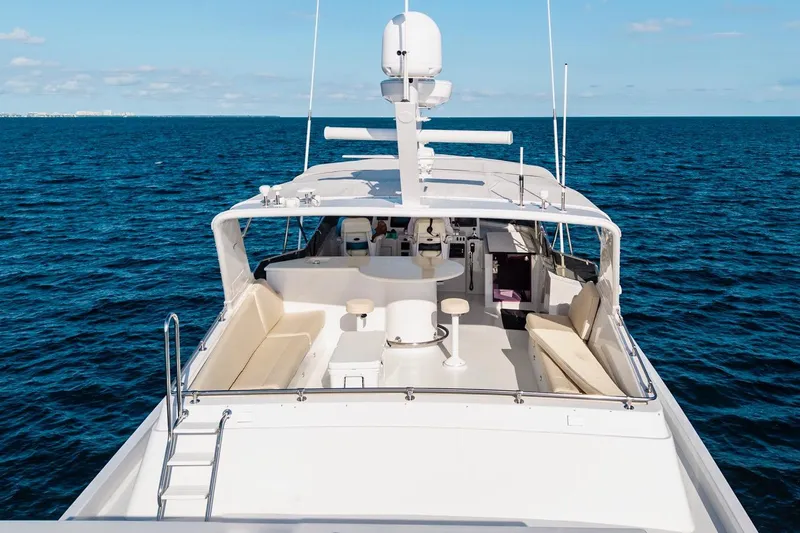  Yacht Photos Pics Luxury 2000 Hatteras 74 Cockpit Motor Yacht on open sea, spacious deck view.