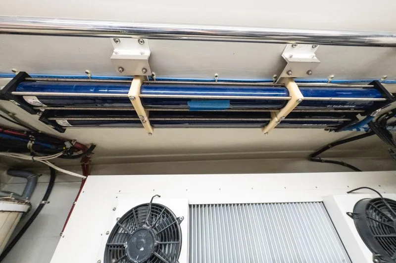  Yacht Photos Pics Engine room of 2000 Hatteras 74 Cockpit Motor Yacht with ventilation system.