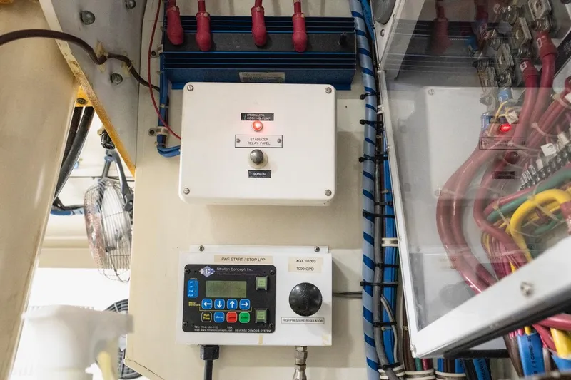  Yacht Photos Pics Electrical control panel in a 2000 Hatteras 74 Cockpit Motor Yacht engine room.