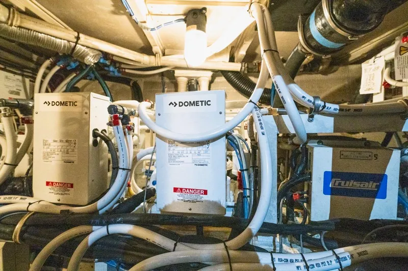  Yacht Photos Pics Engine room of 2000 Hatteras 74 Cockpit Motor Yacht with Dometic equipment.