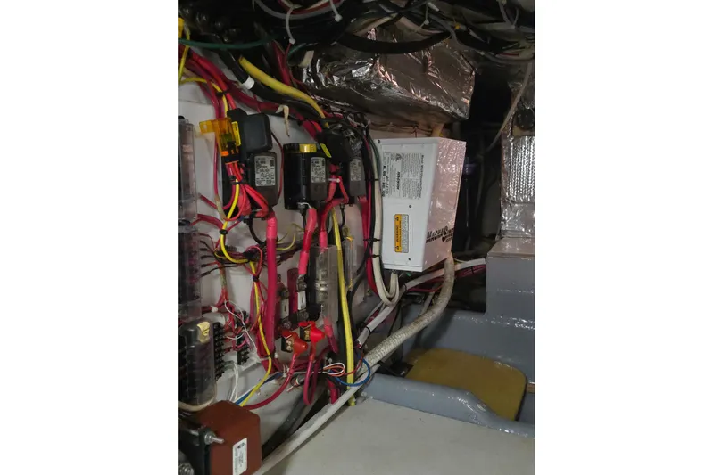 New Bearings Yacht Photos Pics Electrical wiring and components inside a 2000 Nordic Tug 42 Flybridge boat.