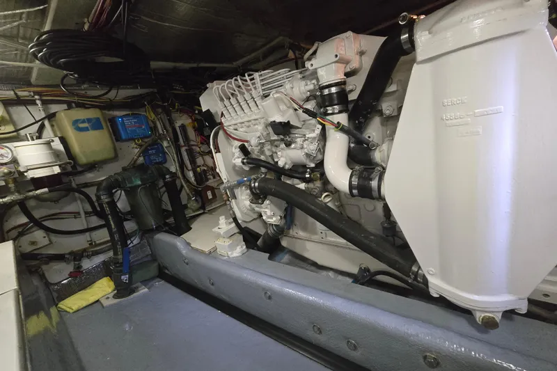 New Bearings Yacht Photos Pics Engine room of a 2000 Nordic Tug 42 Flybridge, showcasing mechanical components.