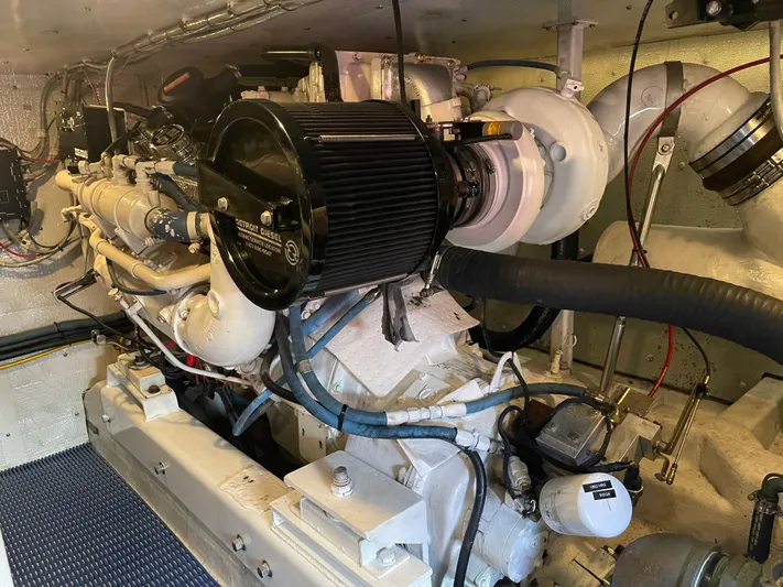  Yacht Photos Pics Engine room of 2002 Canoe Cove 50 Pilothouse Luxury Yacht, showcasing mechanical components.