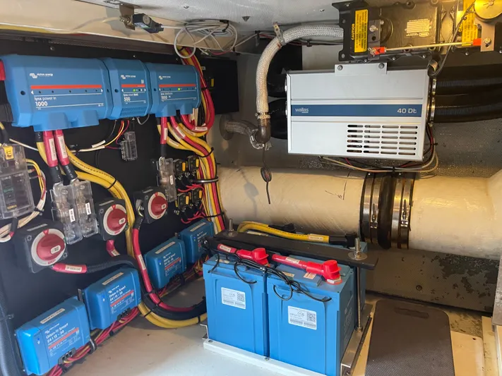  Yacht Photos Pics Electrical system of a 2002 Canoe Cove 50 Pilothouse Luxury Yacht, featuring batteries and wiring.