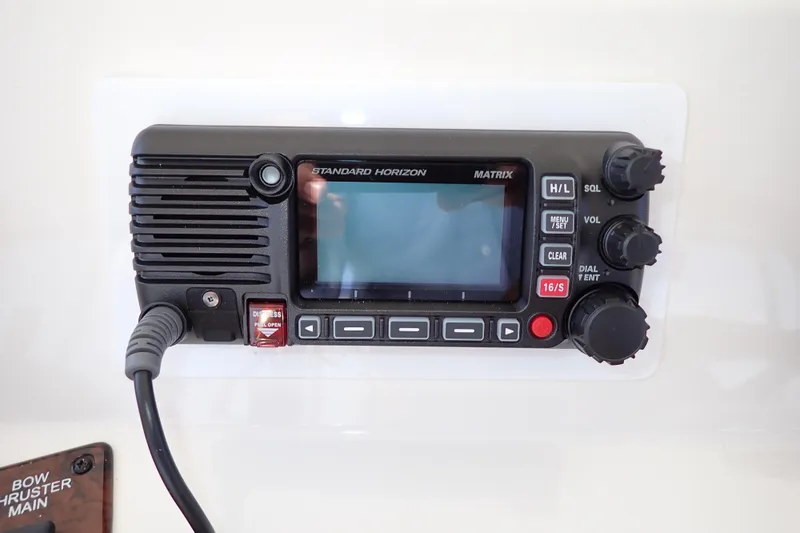 Lattitude Adjustment Yacht Photos Pics Standard Horizon Matrix radio on 2003 Sea Ray 480 Sedan Bridge yacht dashboard.