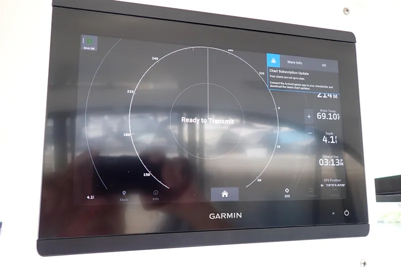 Lattitude Adjustment Yacht Photos Pics Garmin marine display on 2003 Sea Ray 480 Sedan Bridge, showing radar and navigation data.