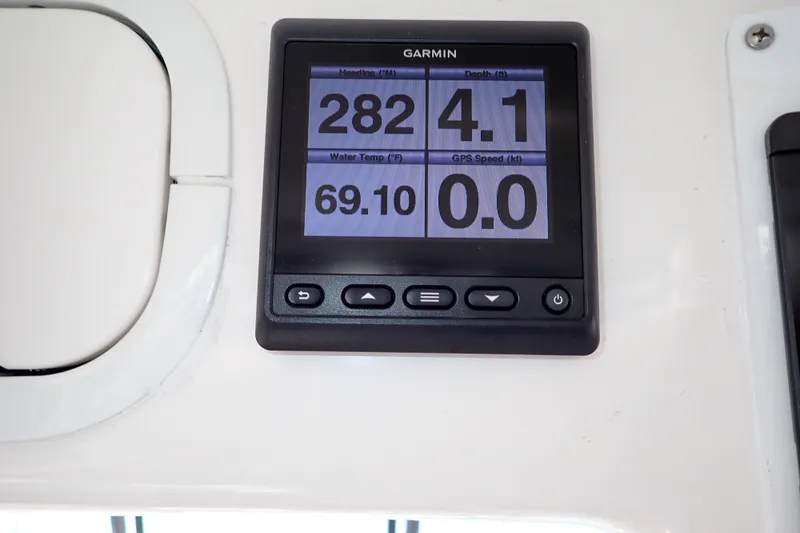 Lattitude Adjustment Yacht Photos Pics Garmin display on 2003 Sea Ray 480 Sedan Bridge showing heading, depth, water temperature, and GPS speed.