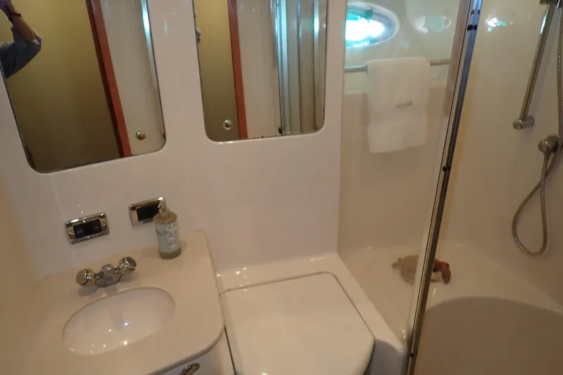 Lattitude Adjustment Yacht Photos Pics Bathroom interior of 2003 Sea Ray 480 Sedan Bridge yacht with shower and sink.