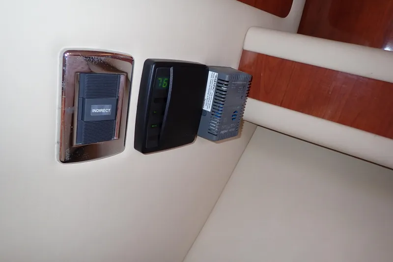 Lattitude Adjustment Yacht Photos Pics Control panel and switch inside 2003 Sea Ray 480 Sedan Bridge yacht.