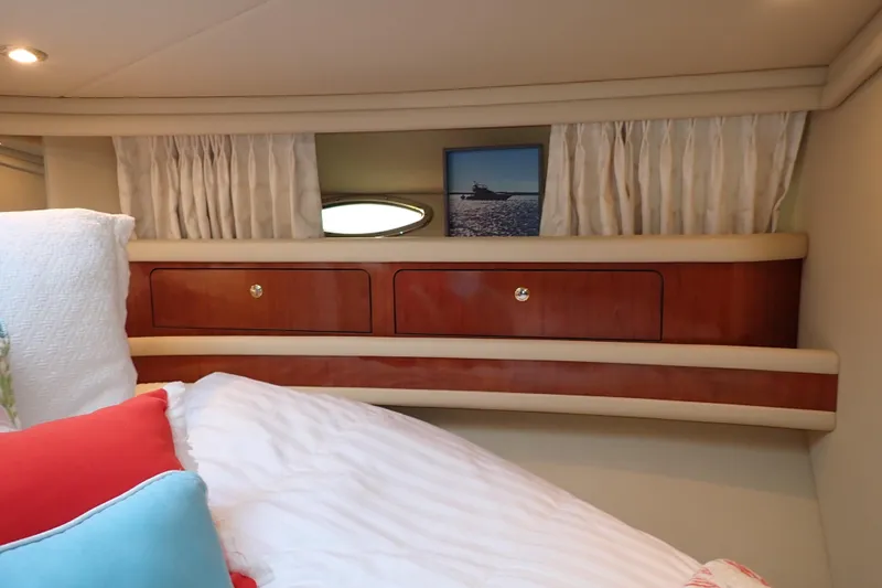 Lattitude Adjustment Yacht Photos Pics Luxurious cabin interior of 2003 Sea Ray 480 Sedan Bridge yacht with elegant wood cabinetry.