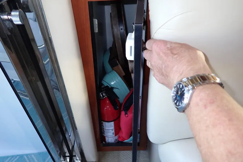 Lattitude Adjustment Yacht Photos Pics Hand opening storage compartment on 2003 Sea Ray 480 Sedan Bridge yacht.