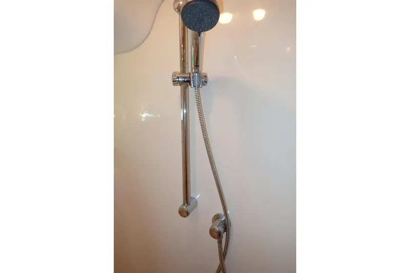 Lattitude Adjustment Yacht Photos Pics Shower fixture in 2003 Sea Ray 480 Sedan Bridge yacht bathroom.