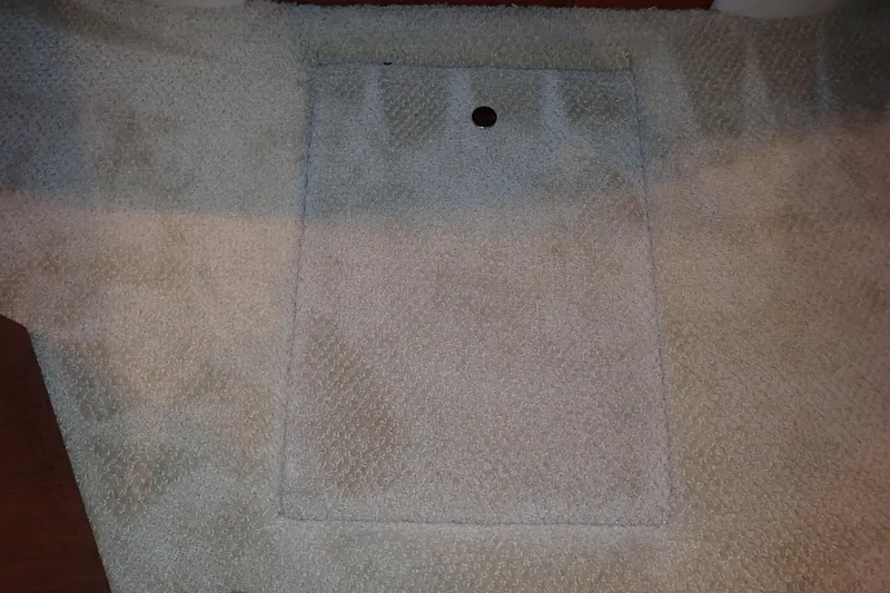 Lattitude Adjustment Yacht Photos Pics Beige carpet with a rectangular cutout and a circular hole, Sea Ray 480 Sedan Bridge 2003.