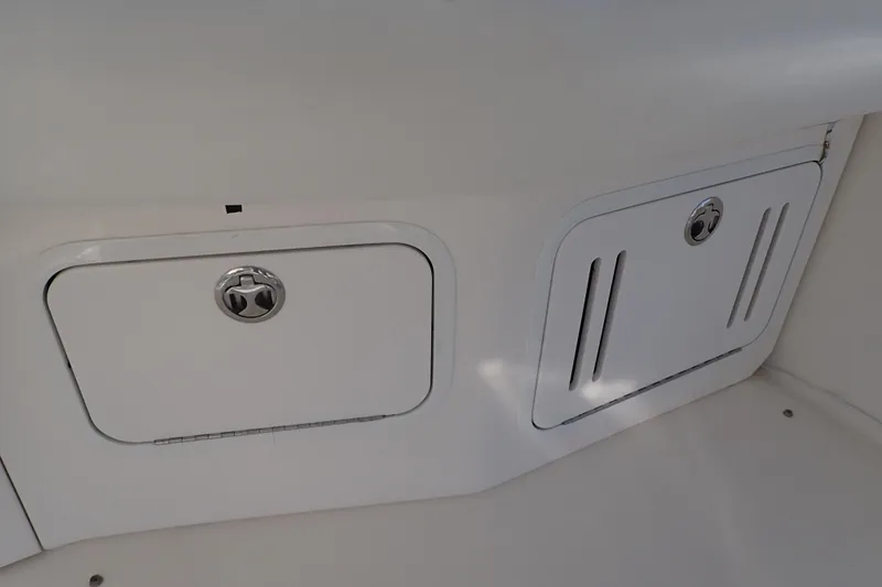 Lattitude Adjustment Yacht Photos Pics Storage compartments on a 2003 Sea Ray 480 Sedan Bridge yacht.
