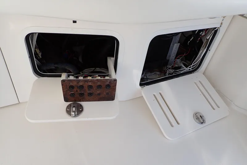 Lattitude Adjustment Yacht Photos Pics Open electrical panel on a 2003 Sea Ray 480 Sedan Bridge yacht.